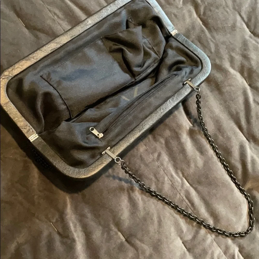 Black metal mesh clutch